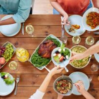 My Local Utah Local Brunch Restaurant Guide | My Local Utah Group of people eating at table with breakfast food my local utah