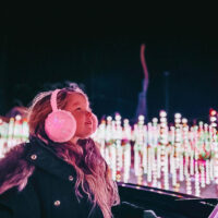 Holiday Events in Utah for Families Explore the Christmas in Color Light Displays | My Local Utah Joyful kids by the giant christmas tree at christmas in color my local utah