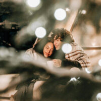 A couple enjoys a peaceful romantic evening in a cozy cabin in the winter Highlighting winter date ideas in utah my local utah