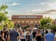 Crowd at the Harvest Moon Festival on Historic 25th Street in Ogden, Utah, with Union Station in the background