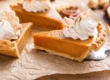 Pumpkin pie slices on parchment paper.