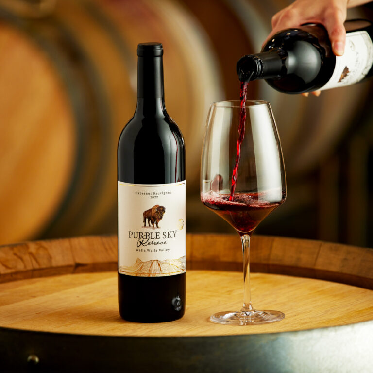 Purple sky winery red wine being poured into class.