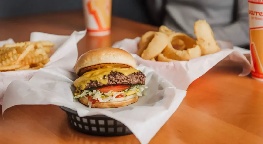 Burgers fries onions rings shakes from warrens and dylans.